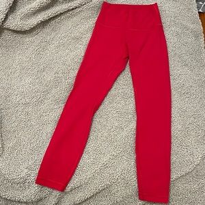 Red Lululemon leggings - no size tag but are size 4